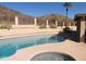 Inviting kidney-shaped pool and spa, perfect for outdoor entertaining at 3626 E Thunderhill Pl, Phoenix, AZ 85044