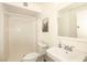 Simple bathroom, featuring a toilet, sink, and shower/tub combo at 3928 N Granite Reef Rd, Scottsdale, AZ 85251