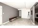 Entryway with tile floors and wooden bench at 3928 N Granite Reef Rd, Scottsdale, AZ 85251