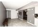 Entryway with tile flooring and view into living room with fireplace at 3928 N Granite Reef Rd, Scottsdale, AZ 85251