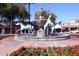 Ornate fountain with horse statues and red flowers at 3928 N Granite Reef Rd, Scottsdale, AZ 85251