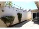 Small, private patio with string lights and small potted plants at 3928 N Granite Reef Rd, Scottsdale, AZ 85251