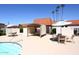 Community pool with tables and shade at 3928 N Granite Reef Rd, Scottsdale, AZ 85251