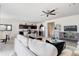 Open concept living room with view into kitchen and dining area at 5099 E Umber Rd, San Tan Valley, AZ 85143