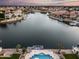 Luxury waterfront home with private pool and expansive lake views at 5635 W Melinda Ln, Glendale, AZ 85308