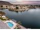 Lakefront home with private pool and dock; picturesque views of lake and mountains at 5635 W Melinda Ln, Glendale, AZ 85308