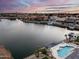 Stunning lakefront property with private pool and dock; beautiful sunset views at 5635 W Melinda Ln, Glendale, AZ 85308