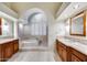 Elegant bathroom with double vanities, soaking tub, and separate shower at 5635 W Melinda Ln, Glendale, AZ 85308