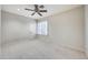 Bedroom with ceiling fan and view of the backyard at 5635 W Melinda Ln, Glendale, AZ 85308