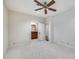 Bedroom with ceiling fan and en-suite bathroom at 5635 W Melinda Ln, Glendale, AZ 85308