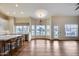 Bright dining area with hardwood floors and water views at 5635 W Melinda Ln, Glendale, AZ 85308