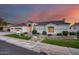 Beautiful one-story home with a three-car garage and mature landscaping at 5635 W Melinda Ln, Glendale, AZ 85308