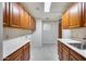 Laundry room with ample cabinetry and sink at 5635 W Melinda Ln, Glendale, AZ 85308