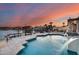 Relaxing pool area with water features and lake view at 5635 W Melinda Ln, Glendale, AZ 85308