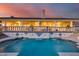 Luxury pool and patio with cascading water feature and elegant columns at 5635 W Melinda Ln, Glendale, AZ 85308