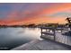 Serene waterfront deck with sunset view, perfect for relaxing at 5635 W Melinda Ln, Glendale, AZ 85308