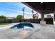 Beautiful outdoor pool and patio area with an outdoor bar, perfect for entertaining guests at 6331 E Earll Dr, Scottsdale, AZ 85251