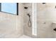 Contemporary shower with dual shower heads and built-in niche at 6331 E Earll Dr, Scottsdale, AZ 85251