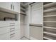 Large walk-in closet with ample shelving and hanging space at 7153 E Ironwood Dr, Paradise Valley, AZ 85253