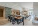 Open concept dining area with a view into the living room and kitchen at 7153 E Ironwood Dr, Paradise Valley, AZ 85253