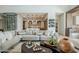 Modern living room with a unique coffee table and comfortable seating at 7153 E Ironwood Dr, Paradise Valley, AZ 85253