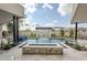 Relaxing pool area with waterfall and fire pit at 7153 E Ironwood Dr, Paradise Valley, AZ 85253