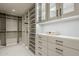 Large walk-in closet, built-in shelves, and drawers at 7153 E Ironwood Dr, Paradise Valley, AZ 85253