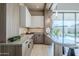 Sleek wet bar featuring a contemporary design and stone countertops at 7153 E Ironwood Dr, Paradise Valley, AZ 85253