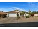 Charming single-story home with a well-manicured desert landscape and a spacious two-car garage at 7390 E Hanover Way, Scottsdale, AZ 85255