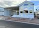 Single-wide manufactured home with carport at 7750 E Broadway Rd # 860, Mesa, AZ 85208