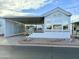 Single-wide manufactured home with carport at 7750 E Broadway Rd # 860, Mesa, AZ 85208