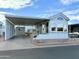 Single-wide manufactured home with carport at 7750 E Broadway Rd # 860, Mesa, AZ 85208