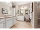 Bright bathroom boasts double vanity and large shower at 7815 W Cinder Brook Way, Florence, AZ 85132