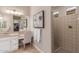 Spa-like bathroom with a large shower and vanity at 7815 W Cinder Brook Way, Florence, AZ 85132