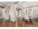 Bright dining room with hardwood floors and chandelier at 7815 W Cinder Brook Way, Florence, AZ 85132