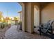 Relaxing patio area with brick pavers and comfortable chairs at 7815 W Cinder Brook Way, Florence, AZ 85132