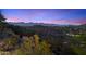 Night view of home and surrounding mountains at 8150 N 47Th St, Paradise Valley, AZ 85253