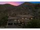 Luxury home nestled in the mountains at sunset at 8150 N 47Th St, Paradise Valley, AZ 85253