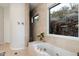 Bathroom with soaking tub, shower and views at 8150 N 47Th St, Paradise Valley, AZ 85253