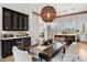 Elegant dining area with a rustic table and mountain views at 8150 N 47Th St, Paradise Valley, AZ 85253