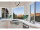 Kitchen sink with mountain views from large windows at 8150 N 47Th St, Paradise Valley, AZ 85253