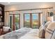 Main bedroom with stunning mountain views and private balcony at 8150 N 47Th St, Paradise Valley, AZ 85253