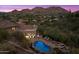 Luxury home with a freeform pool and expansive patio at 8150 N 47Th St, Paradise Valley, AZ 85253