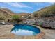 Inviting kidney-shaped pool with mountain backdrop at 8150 N 47Th St, Paradise Valley, AZ 85253