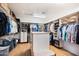 Large walk-in closet with ample shelving and hanging space at 8150 N 47Th St, Paradise Valley, AZ 85253