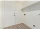 Laundry room with built-in shelving at 8732 W Granada Rd, Phoenix, AZ 85037