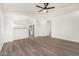 Open living room with kitchen views and vinyl plank flooring at 8732 W Granada Rd, Phoenix, AZ 85037