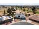 Single-story home with solar panels and putting green at 10377 W White Mountain Rd, Sun City, AZ 85351