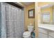 Clean bathroom with shower stall, toilet and white vanity at 10377 W White Mountain Rd, Sun City, AZ 85351