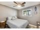 Cozy bedroom features a comfortable bed with soft pillows and neutral colors, providing a serene atmosphere at 10433 E Boise St, Apache Junction, AZ 85120